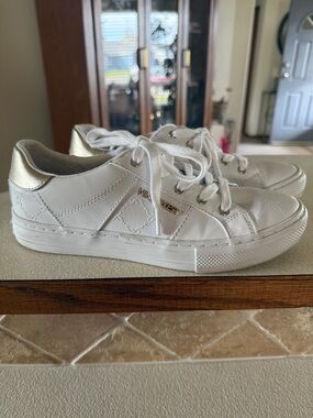 Nine West White Low-Top Sneakers with Gold Heel Accent